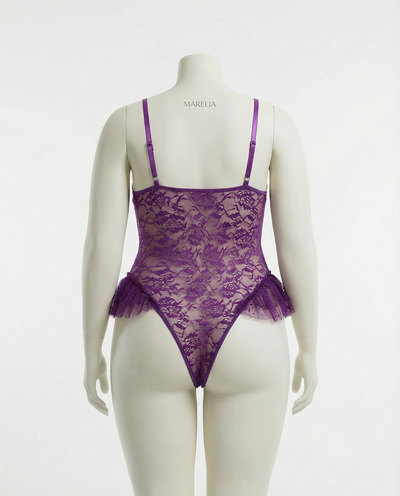 Purple crotchless lace teddy with accessories