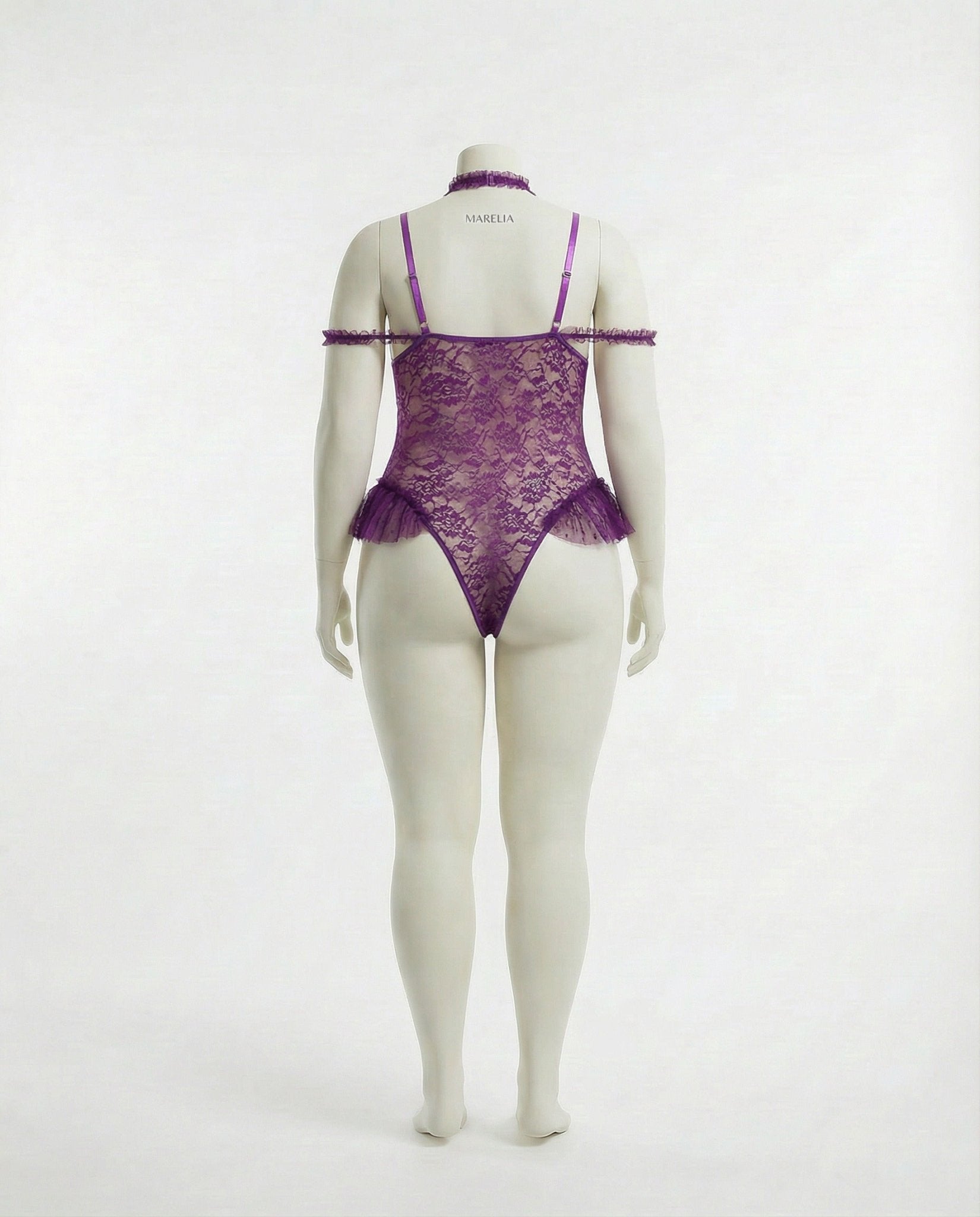 Purple crotchless lace teddy with accessories