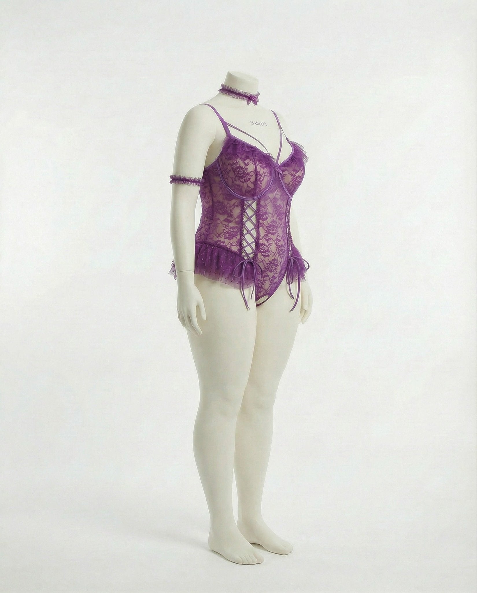 Purple crotchless lace teddy with accessories